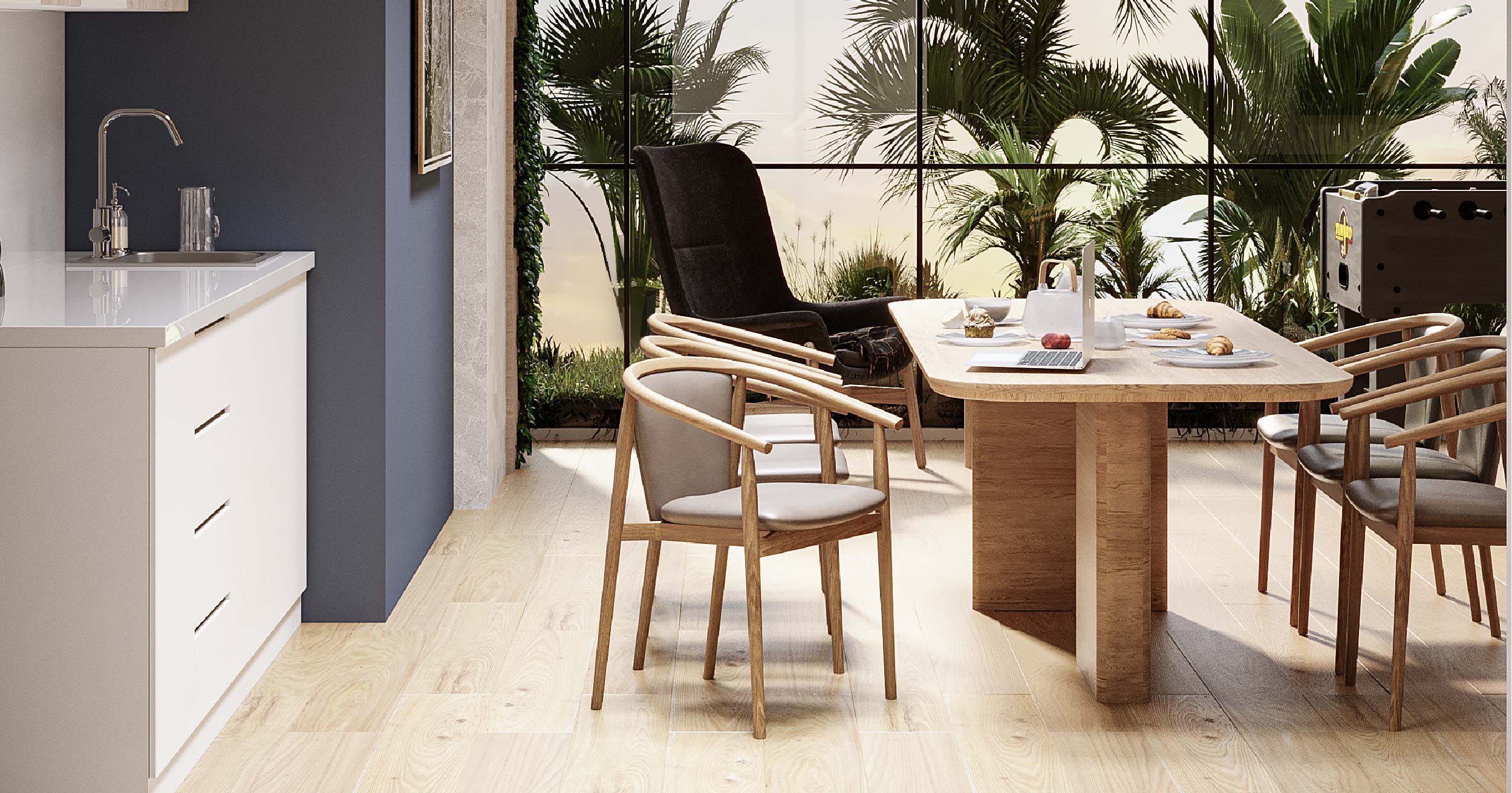 Westwood By Imtiaz A modern dining area featuring a wooden table, comfortable chairs, and lush greenery in the background.